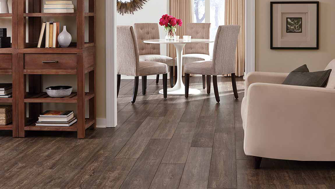 Laminate flooring in a living and dining area, installation services available