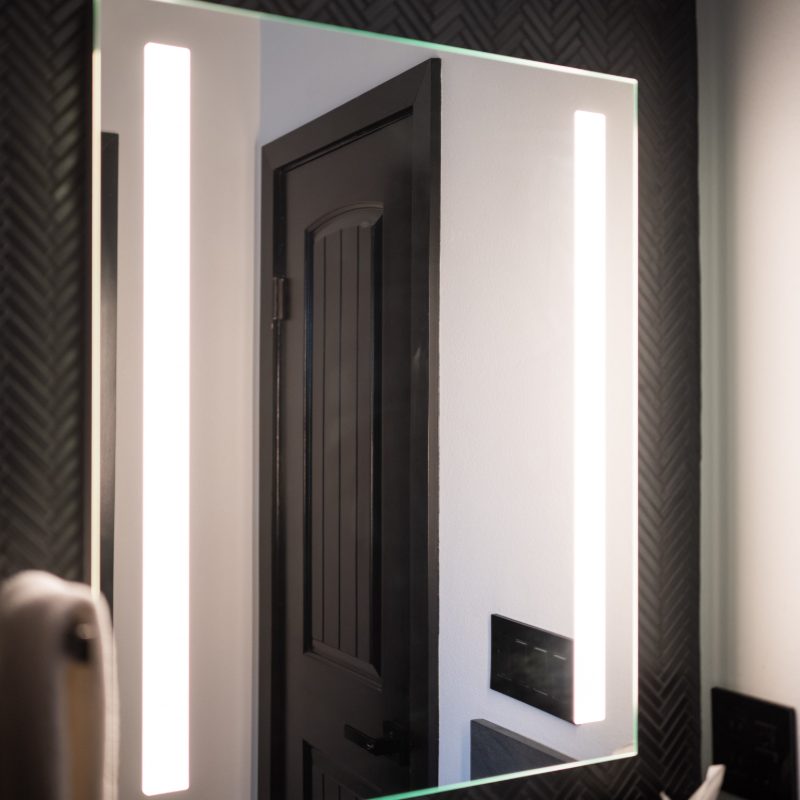 bathroom vanity mirror and lighting