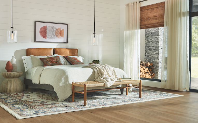 honey colored wood look laminate in bedroom